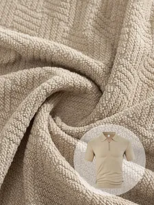 Macro detail of beige jacquard towel fabric for men's business casual polo shirt set