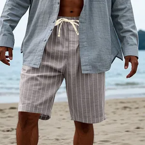 Close-up of men's summer grey striped linen-look shorts with drawstring detail