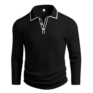 Detail of men's black long-sleeve Polo shirt featuring a ribbed texture and white piping