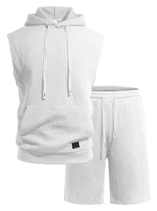Detail of men's white knitted sleeveless hoodie and shorts set with jacquard texture