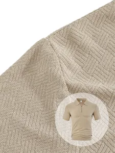 Close-up macro view of the premium textured towel jacquard fabric on men's zip polo shirt