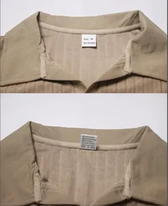 Detail of men's khaki jacquard shirt collar with size M and care label instruction tags.