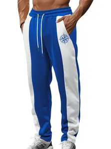 Men's athletic color-block joggers in blue and white with compass logo