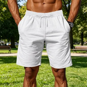 Close-up view of men's white cotton linen casual sports shorts with drawstring waist