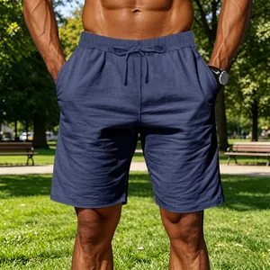 Close-up detail of navy blue men's cotton linen drawstring casual sports shorts.