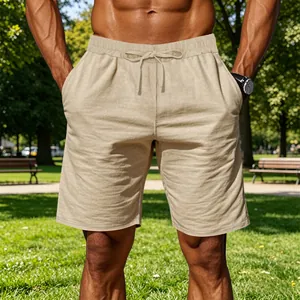 Men's casual cotton linen shorts featuring an elastic drawstring waist in a park setting.