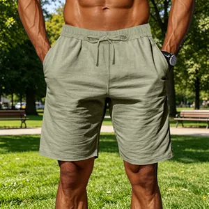 Detail showing the texture and fit of men's khaki cotton linen casual beach shorts