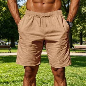 Detail of men's casual cotton linen shorts with adjustable drawstring waist in khaki