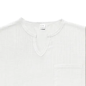 Detailed macro view of men's V-neck T-shirt showing slub linen texture and chest pocket