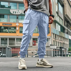 Stylish men's outdoor cargo jogger pants in light blue featuring multi-pocket design