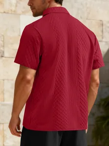 Back view of men's burgundy jacquard polo shirt showing premium textured fabric detail.