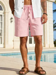 Pantaloncini estivi uomo rosa, asciugatura rapida, con coulisse, vista piscina