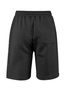 Détail arrière de short jacquard noir pour homme montrant texture et poche