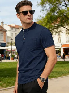 Men's navy blue short sleeve Henley shirt with chest pocket in sunny outdoor setting.