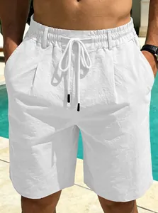 Close-up view of men's white breathable cotton linen beach shorts with drawstring waist