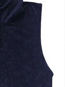 Close-up detail of navy blue hooded sleeveless vest showing textured acid wash fabric