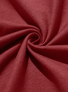 Macro detail of high-quality burgundy wine red knitted fabric texture and draping