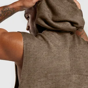 Close-up of men's hooded sleeveless vest showing textured fabric and hood detail
