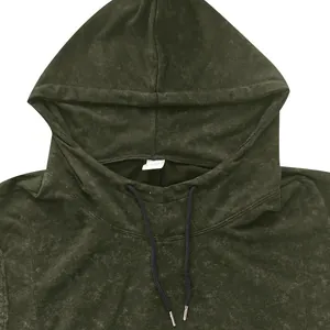 Detail view of men's hooded sleeveless vest with drawstring and textured pattern