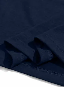 Macro detail of the double-stitched hem on a breathable navy blue cotton Henley shirt.