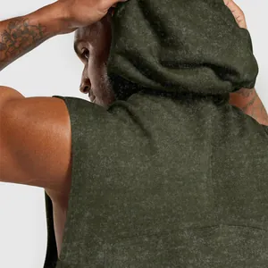 Close-up detail of the textured hood on an olive green men's sleeveless hoodie vest