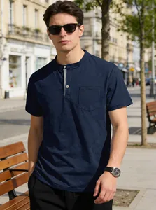 Front view of navy blue short-sleeve Henley shirt for men in street setting