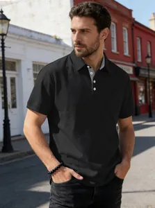 Detail shot of men's casual black short sleeve Polo shirt with a front pocket