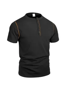 Detail of black waffle knit Henley shirt featuring stylish orange contrast stitching