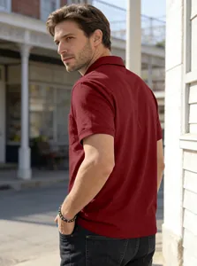 Detailed back view of a maroon men's short sleeve polo shirt featuring a chest pocket