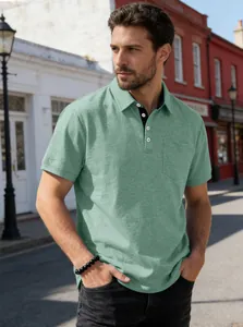 Close-up of sage green polo shirt with chest pocket and classic lapel detail.