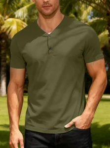 Close-up of a man wearing a breathable olive green Henley short sleeve T-shirt outdoors.