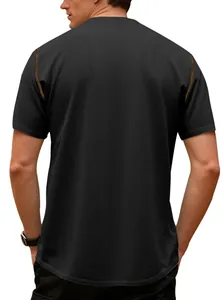 Back view of men's black short sleeve shirt with waffle texture and orange stitching.