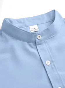 Close-up detail of men's light blue stand collar shirt showing fabric texture and label