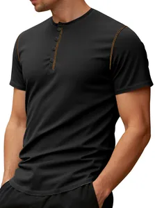Detailed view of men's black short-sleeved Henley shirt with textured waffle knit fabric.