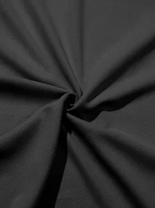 Detailed close-up of black pineapple grid fabric texture for men's breathable Polo shirt