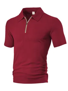 Detailed view of burgundy zip-up polo shirt with textured towel jacquard fabric