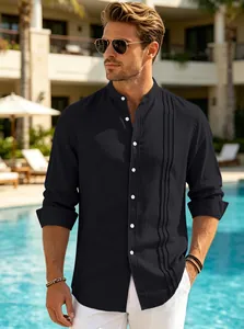 Detailed view of men's black stand collar shirt with elegant vertical pleated front design