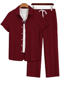 Close-up of burgundy men's ribbed short sleeve shirt and matching long pants set