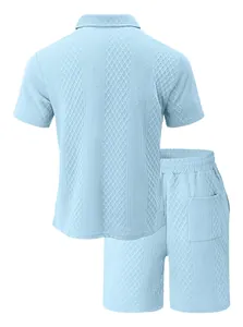 Back view of light blue men's knit polo shirt and shorts set showing waffle texture