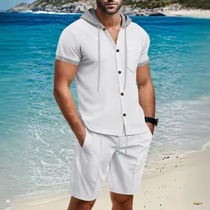 Men's summer white waffle knit hooded shirt and shorts set on a beach background