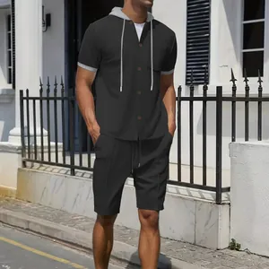 Stylish men's casual black waffle knit two-piece hooded shirt and shorts set outfit