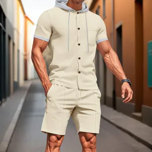 Close-up detail showing the textured waffle fabric of this men's hooded shirt set
