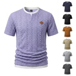 Detail view of men's cable-knit texture T-shirt with layered collar and logo patch