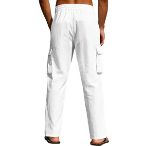 Back view of men's white linen cargo pants featuring functional side flap pockets