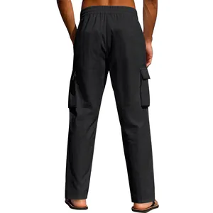 Detailed back view of men's black linen cargo pants featuring side flap pockets.