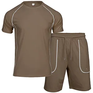 Dettaglio completo sportivo uomo due pezzi con profili a contrasto e coulisse
