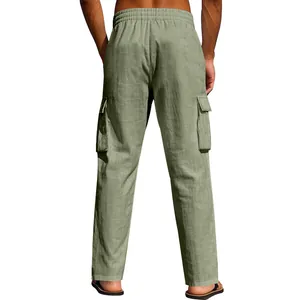 Back view of men's olive green linen cargo pants with elastic waist and side pockets