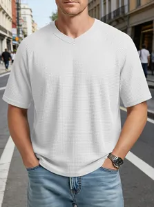 Detailed view of white waffle knit texture and V-neck on men's raglan sleeve T-shirt