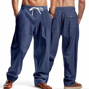Detail view of men's blue breathable wide-leg trousers with elastic drawstring waist