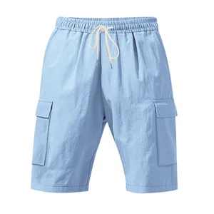 Detailed close-up of light blue men's cargo shorts showing drawstring waistband.